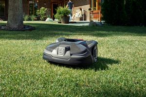 Robotmaaier met begrenzingsdraad